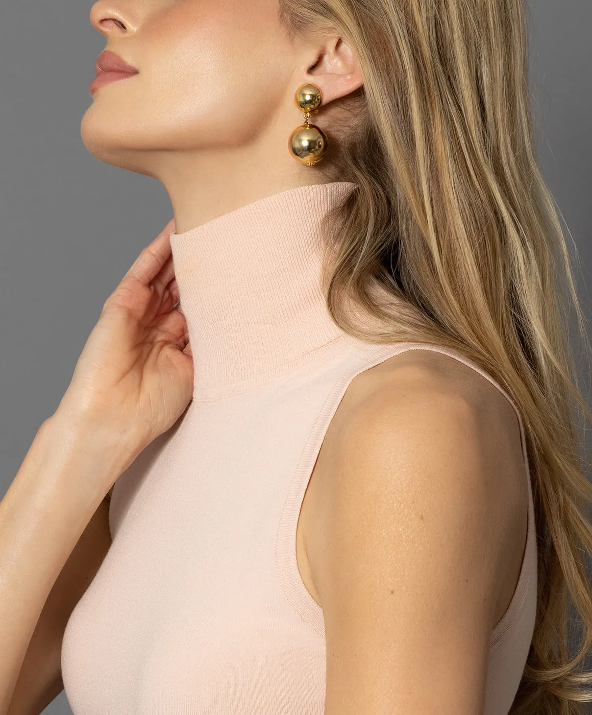 The Sleeveless Turtleneck