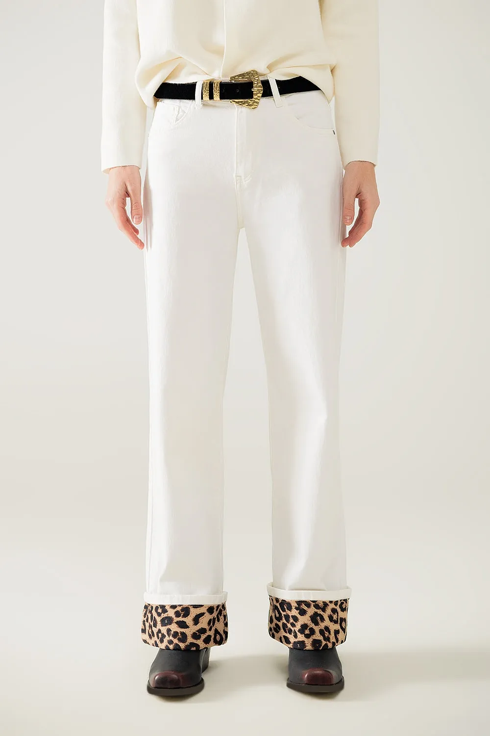 Wide leg cream pants with leopard print at the bottom